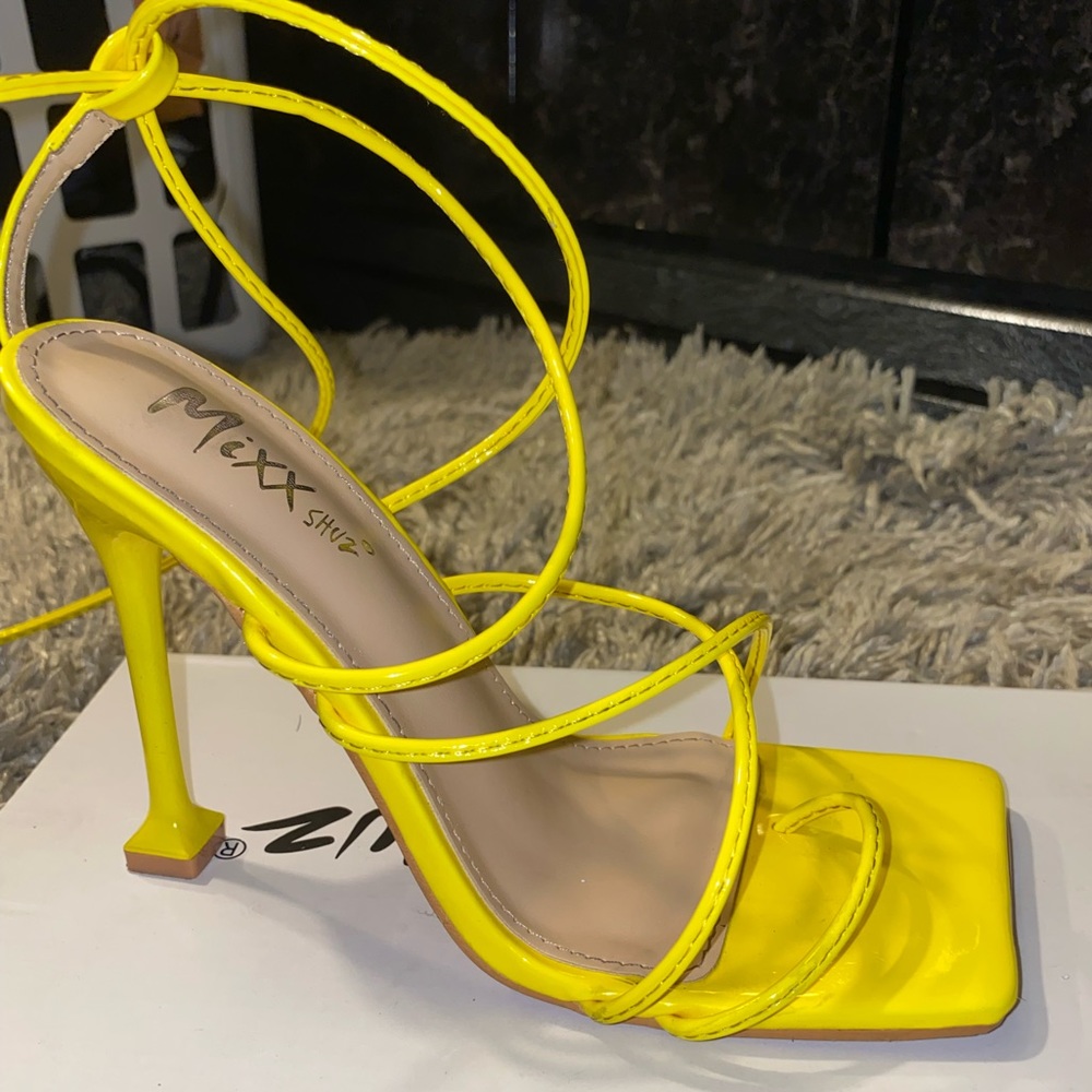 Yellow lace up the leg heels in a size 6. ONLY WORE ONCE